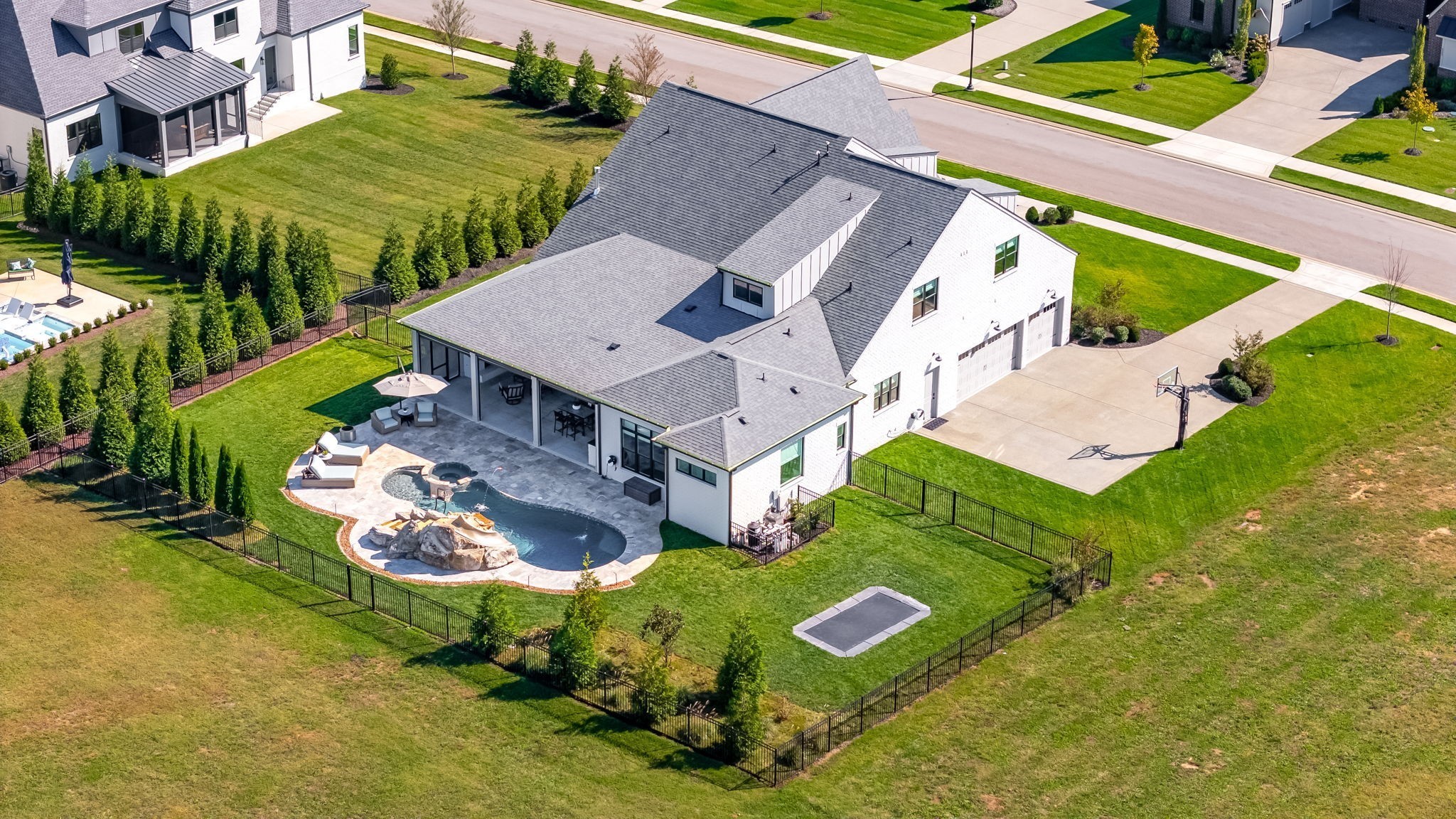 6304 Percheron Lane Arrington, TN 37014 - Photo 54 of 57 an aerial view of a house with a garden and swimming pool