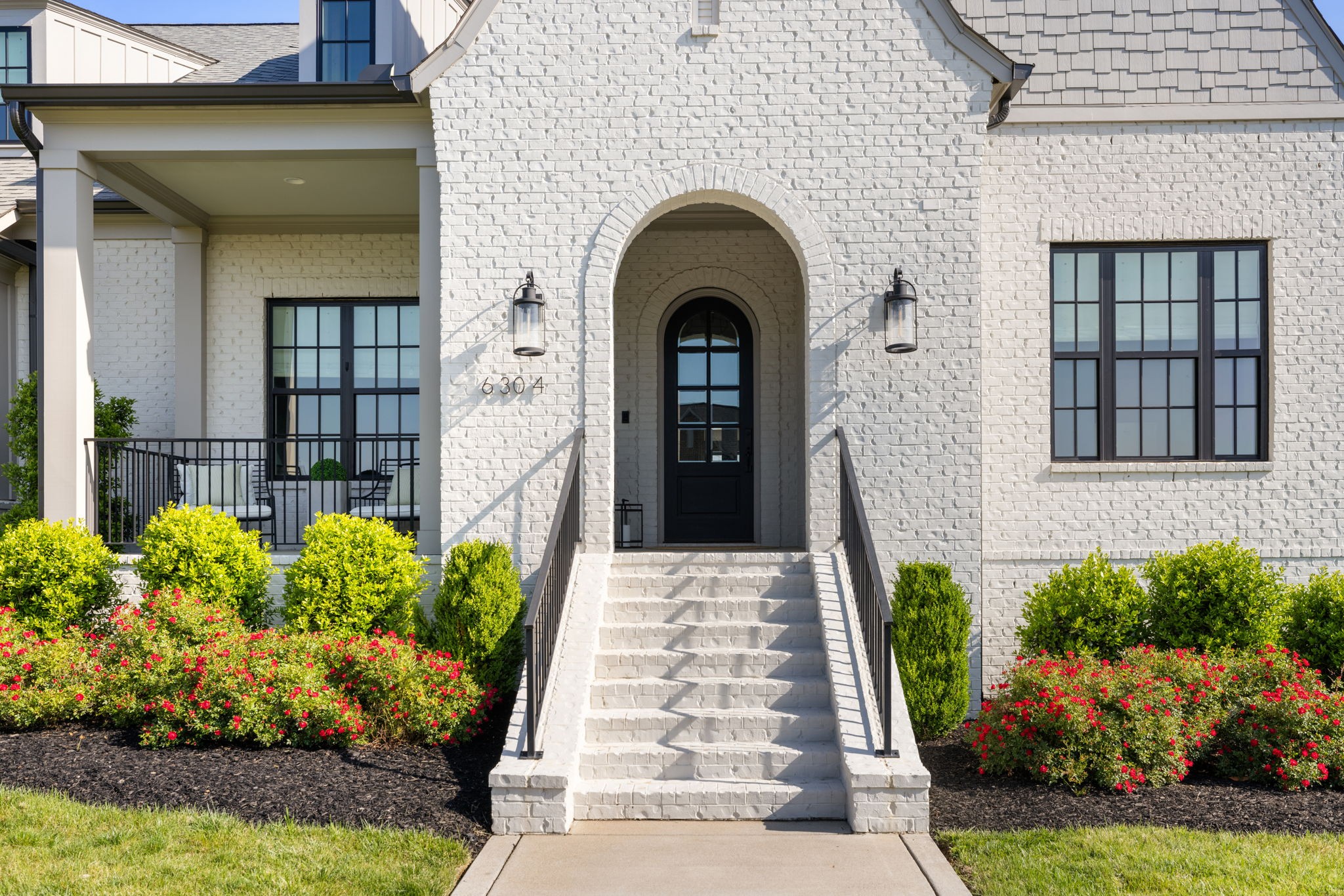 6304 Percheron Lane Arrington, TN 37014 - Photo 6 of 57 a front view of a house with a garden