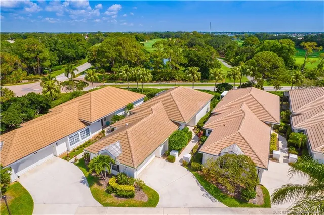 an aerial view of a house with a garden