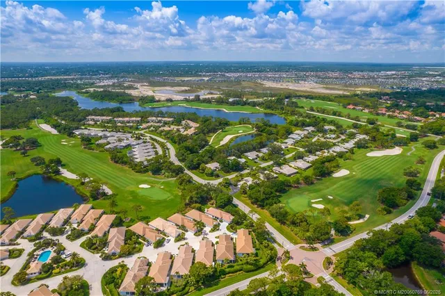 an aerial view of a house with a garden