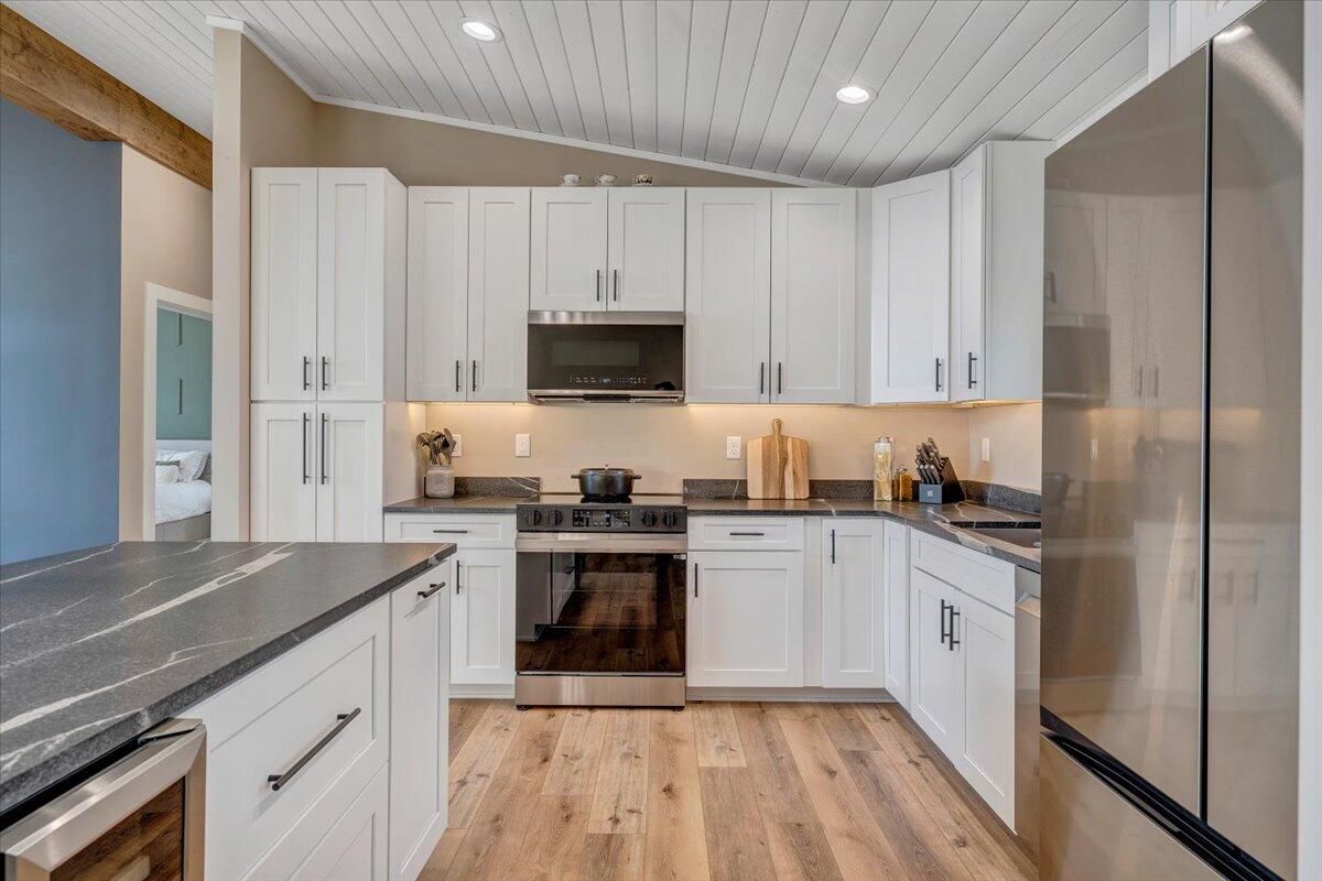 5 Reserve Road Moneta, VA 24121 - Photo 19 of 95 a kitchen with cabinets stainless steel appliances a sink and a counter space