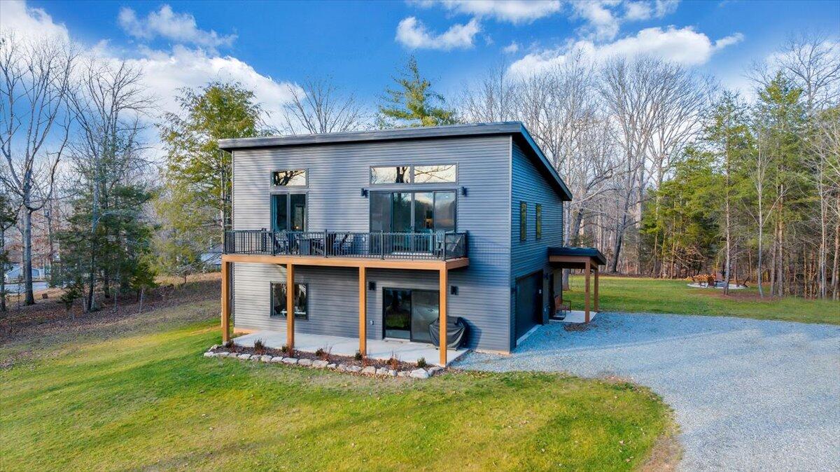 5 Reserve Road Moneta, VA 24121 - Photo 2 of 95 a view of a house with a yard and sitting area
