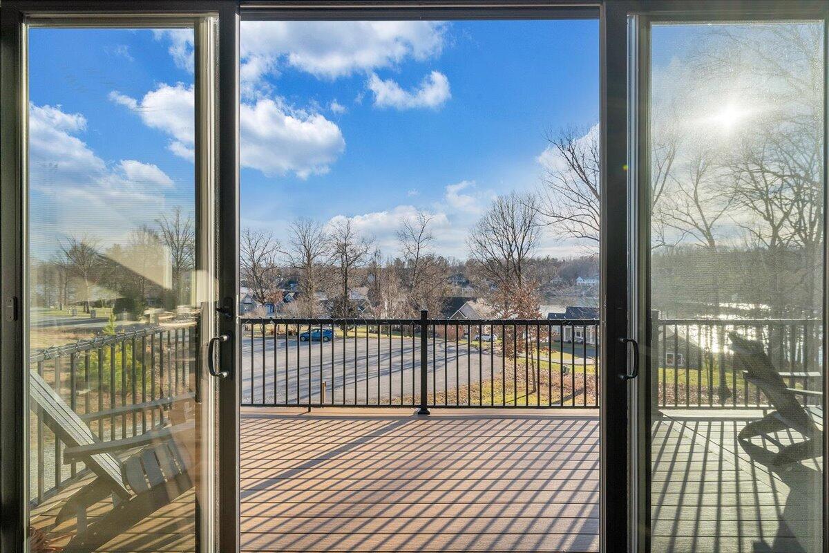 5 Reserve Road Moneta, VA 24121 - Photo 4 of 95 a view of a balcony with a floor to ceiling window next to a building