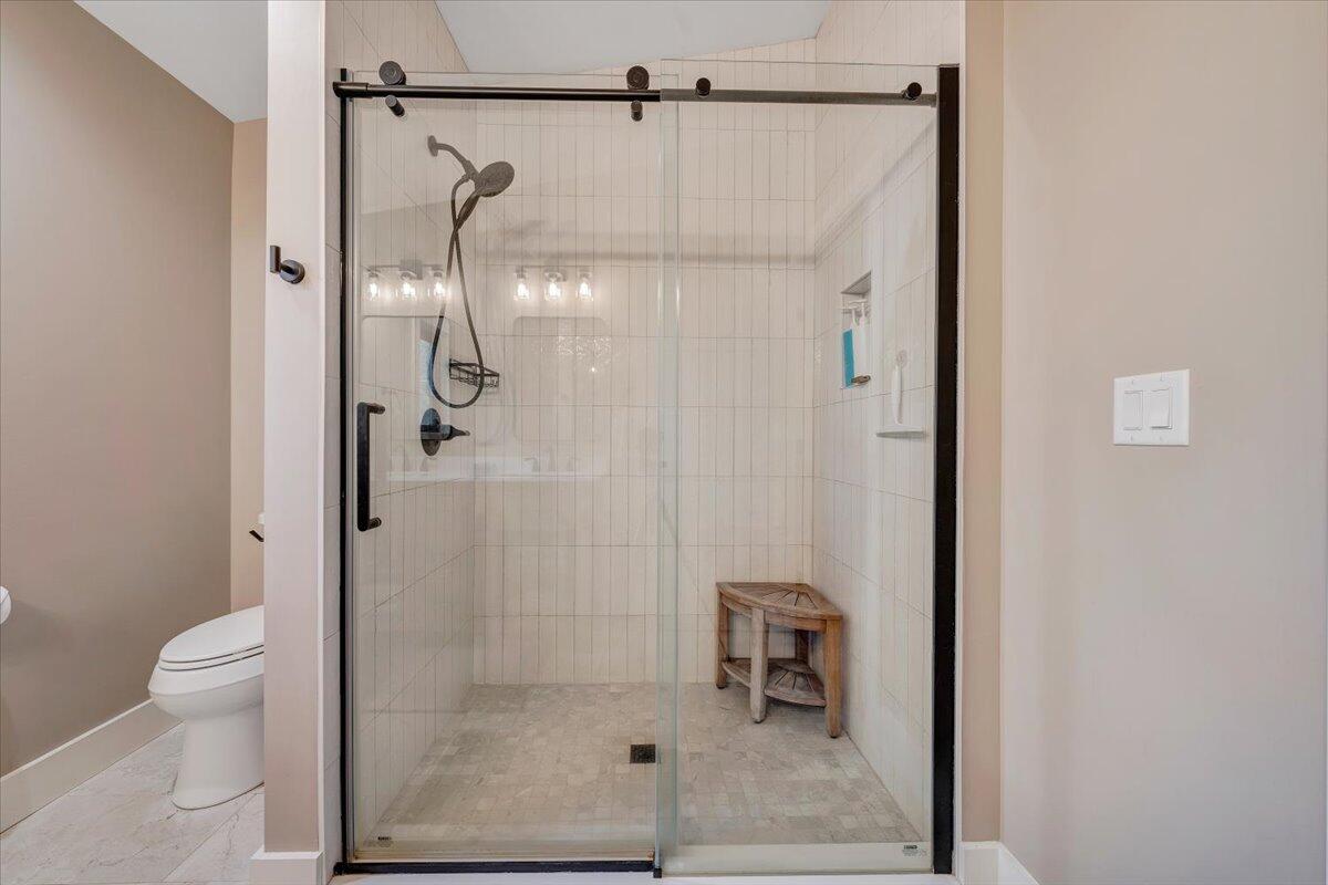 5 Reserve Road Moneta, VA 24121 - Photo 45 of 95 a bathroom with a glass shower door