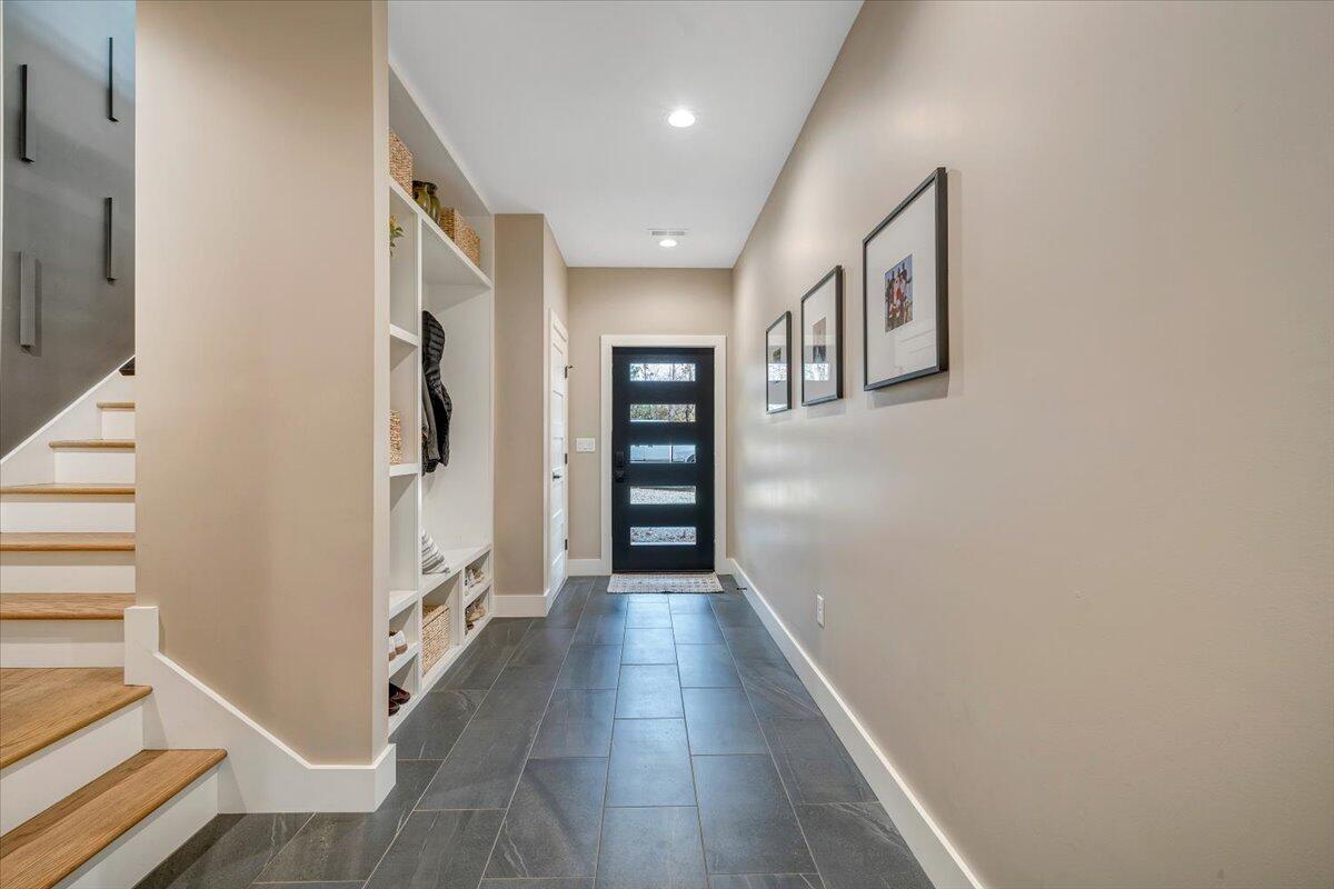 5 Reserve Road Moneta, VA 24121 - Photo 48 of 95 a view of a hallway with wooden floor and staircase