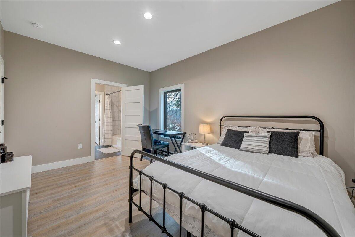 5 Reserve Road Moneta, VA 24121 - Photo 55 of 95 a bedroom with a bed and a night stand