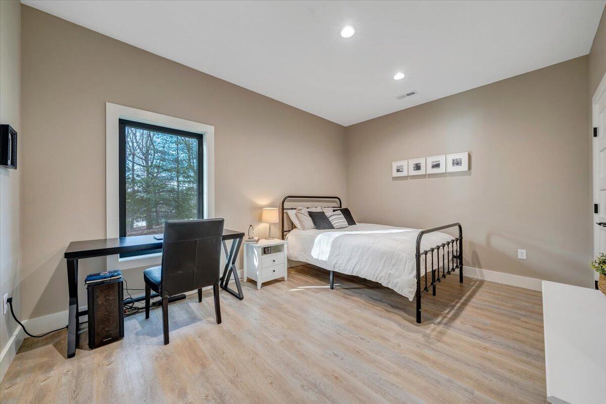 5 Reserve Road Moneta, VA 24121 - Photo 56 of 95 a bedroom with a bed and a desk