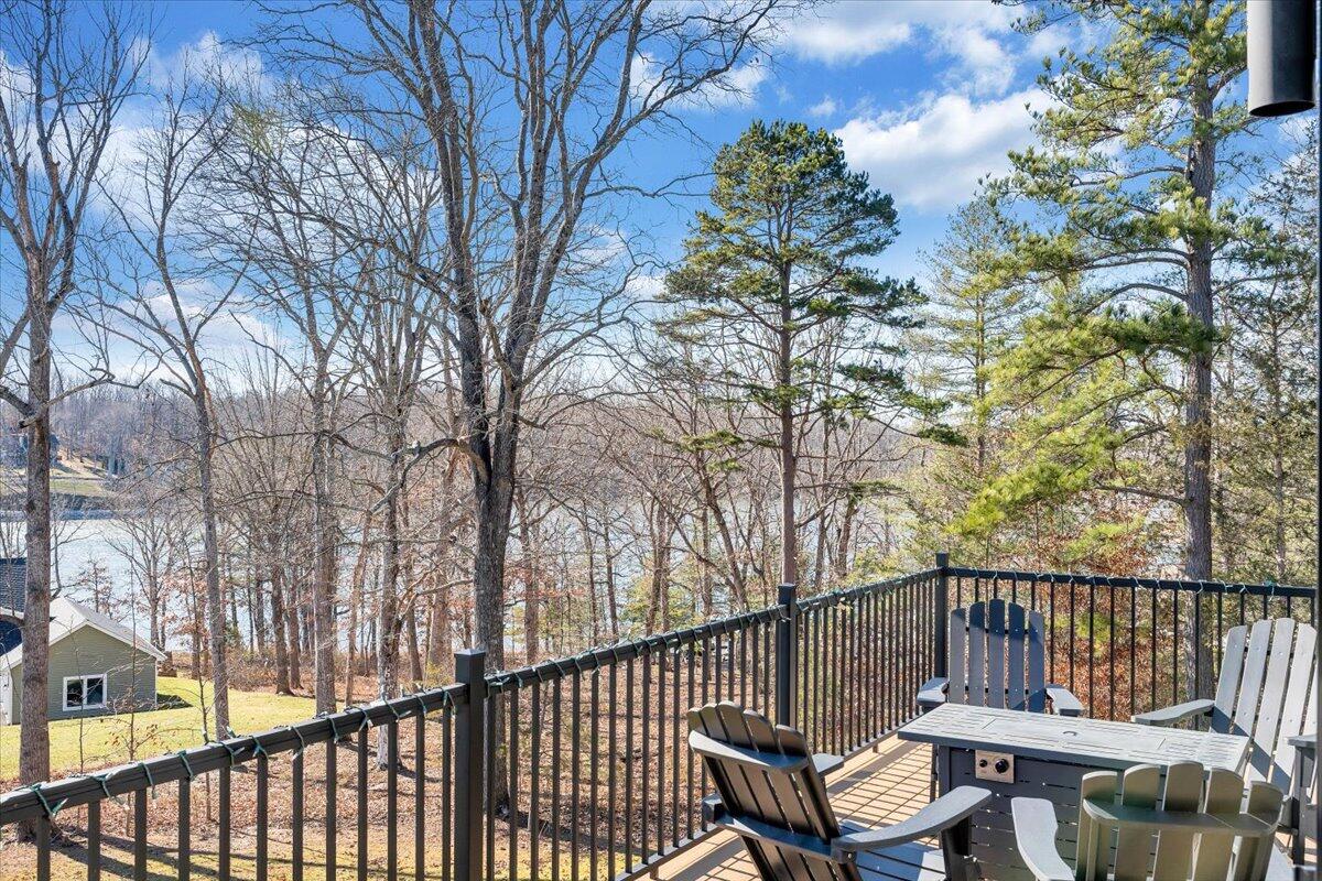5 Reserve Road Moneta, VA 24121 - Photo 88 of 95 a view of a chair and table on the deck