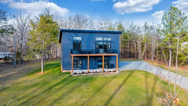 a kitchen with stainless steel appliances refrigerator microwave and stove