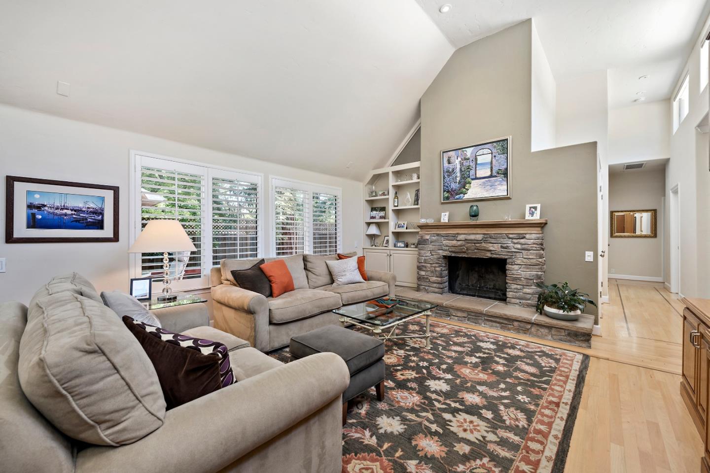 18 Farm Road Los Altos, CA 94024 - Photo 12 of 27 a living room with furniture a rug and a fireplace