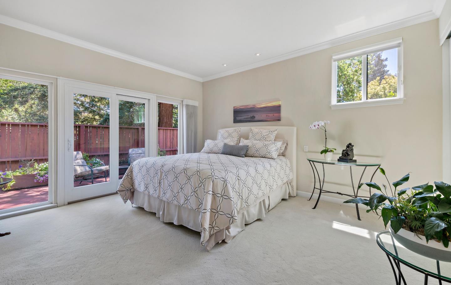 18 Farm Road Los Altos, CA 94024 - Photo 13 of 27 a spacious bedroom with a bed and a window