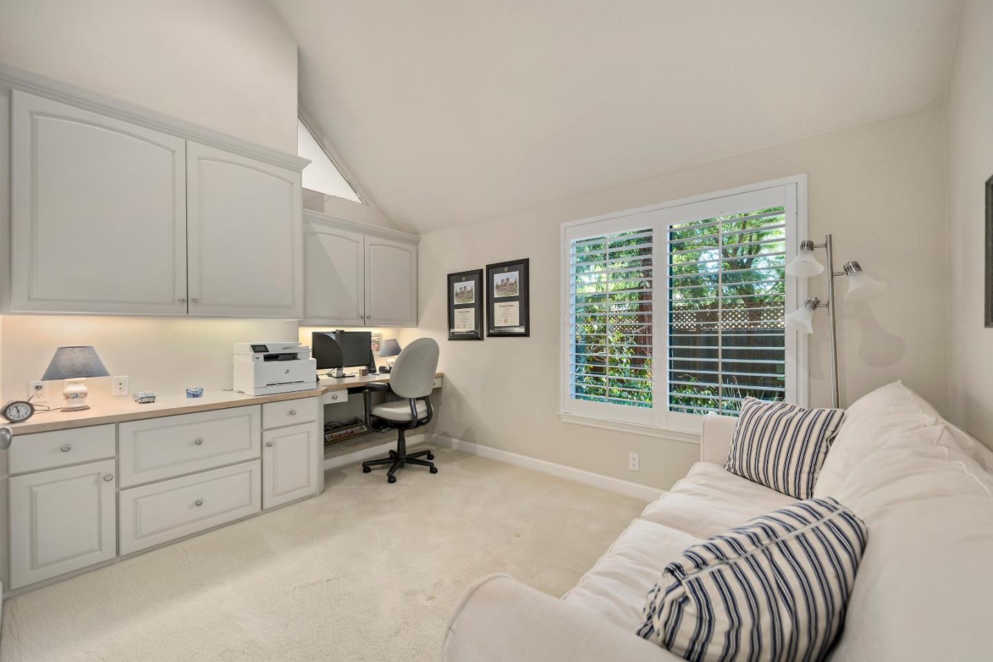 18 Farm Road Los Altos, CA 94024 - Photo 18 of 27 a bed room with a bed and a chair