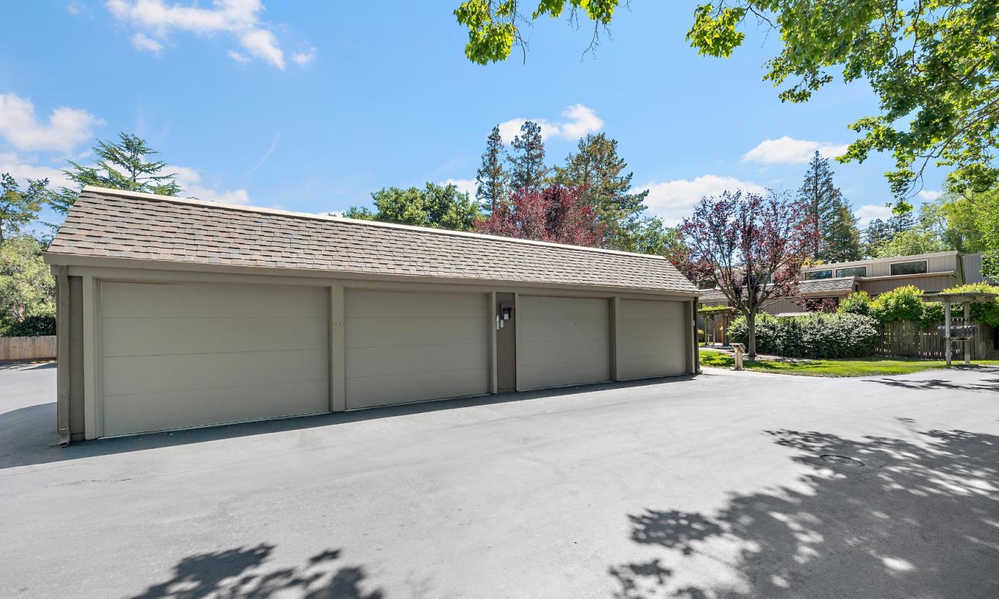 18 Farm Road Los Altos, CA 94024 - Photo 24 of 27 a front view of a house with a yard and garage
