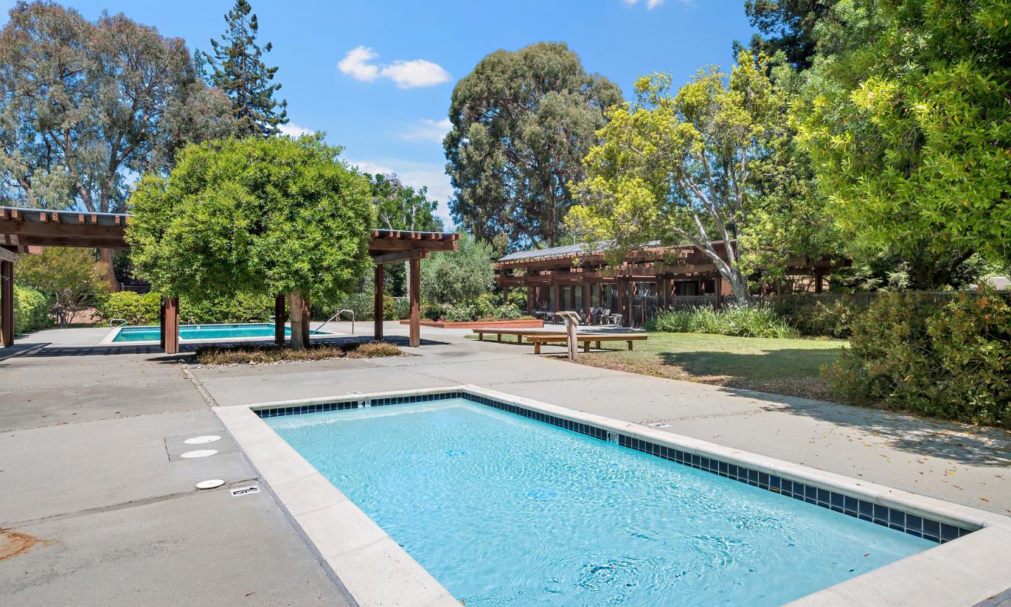 18 Farm Road Los Altos, CA 94024 - Photo 27 of 27 a view of a swimming pool with a patio and a yard