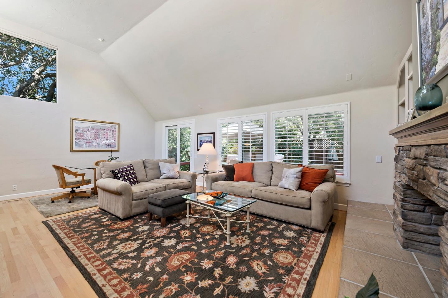 18 Farm Road Los Altos, CA 94024 - Photo 10 of 27 a living room with furniture or couch and a fireplace