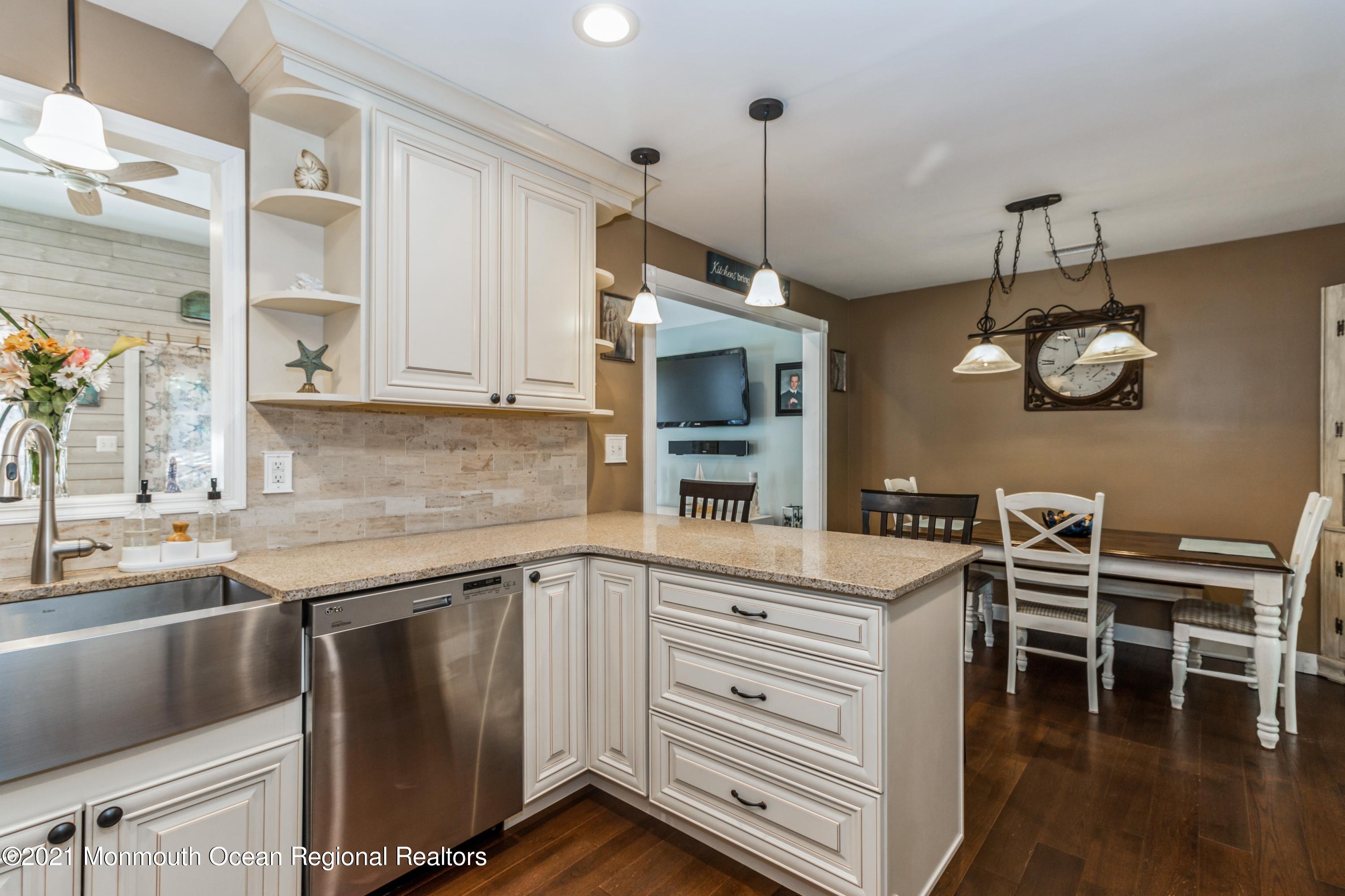 258 Sunnybrook Road Jackson, NJ 08527 - Photo 7 of 20 a kitchen with a sink cabinets and window