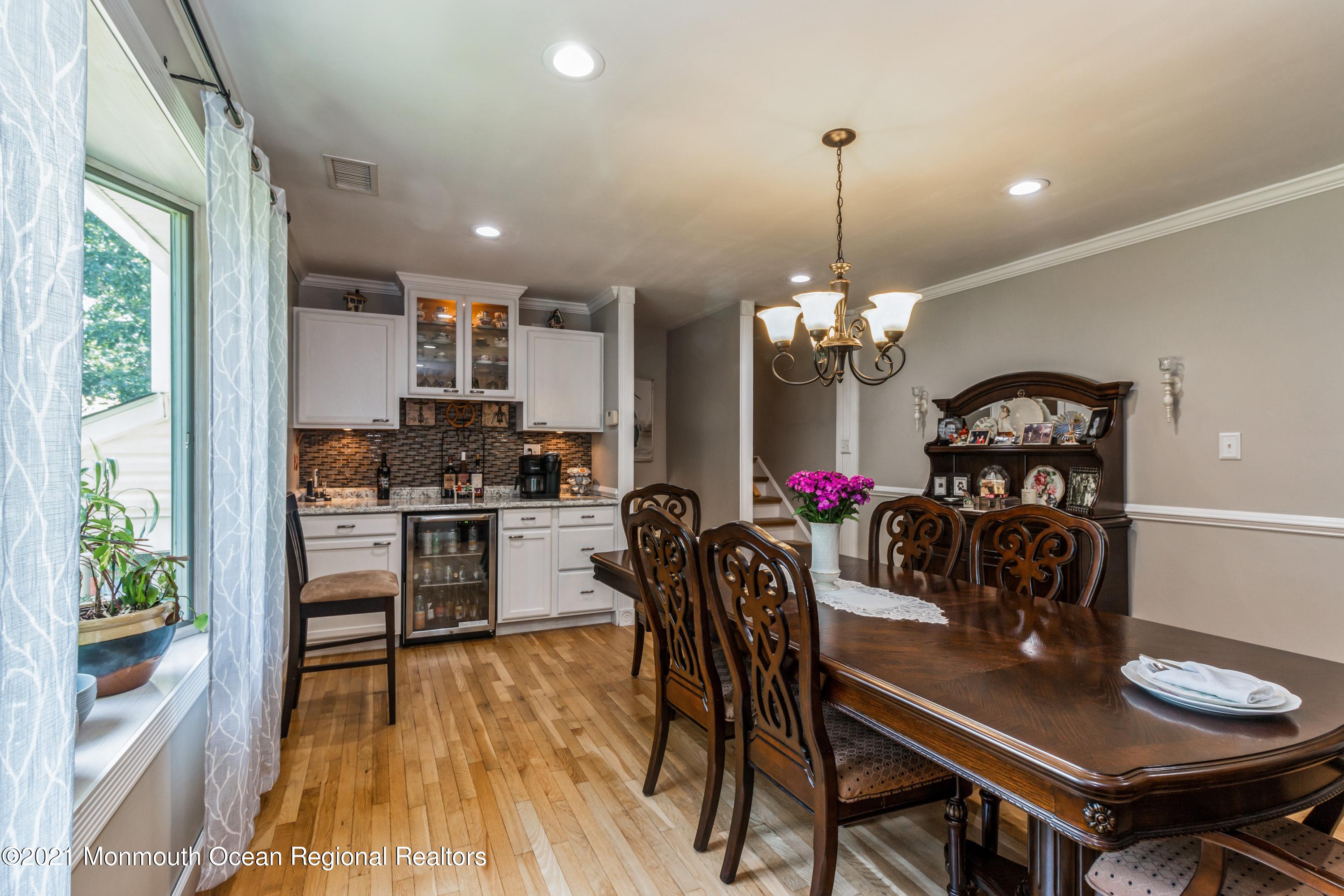 258 Sunnybrook Road Jackson, NJ 08527 - Photo 8 of 20 a view of a dining room with furniture window and wooden floor