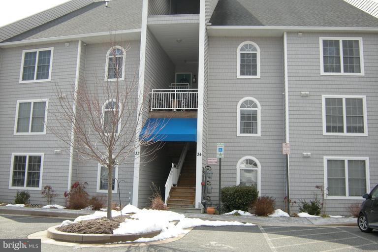 34 Owens Landing Court, Unit 34A Perryville, MD 21903 - Photo 1 of 11 a front view of a house with a yard