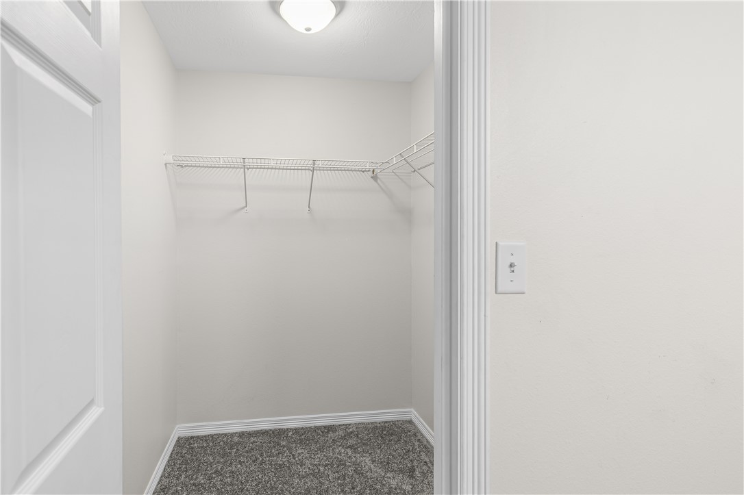 1002 Copperas Bend Caldwell, TX 77836 - Photo 12 of 22 a view of storage and utility room with racks on the wall