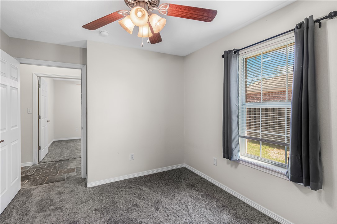 1002 Copperas Bend Caldwell, TX 77836 - Photo 13 of 22 a view of an empty room with a window