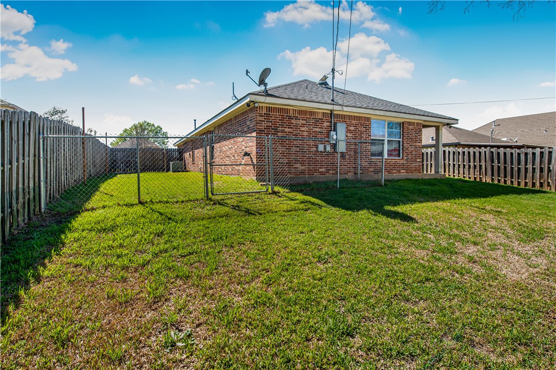 1002 Copperas Bend Caldwell, TX 77836 - Photo 20 of 22 a house view with garden space