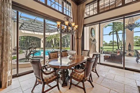 a living room with furniture a fireplace and decor