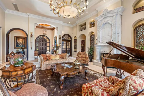 a bathroom with a granite countertop sink a mirror and a shower