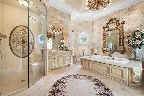 a very nice looking living room with a large window and a table