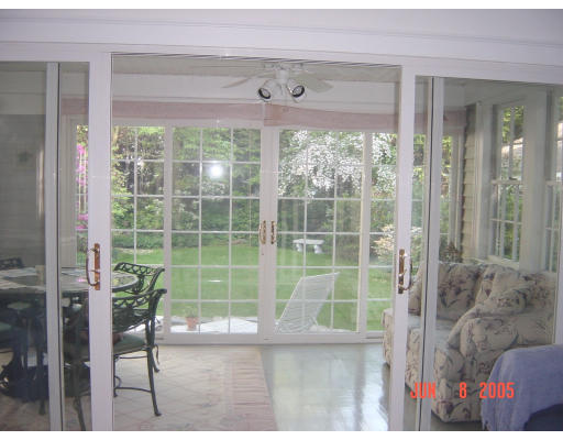 161 Woodcliff Road Newton, MA 02461 - Photo 12 of 30 a view of a porch with a tv