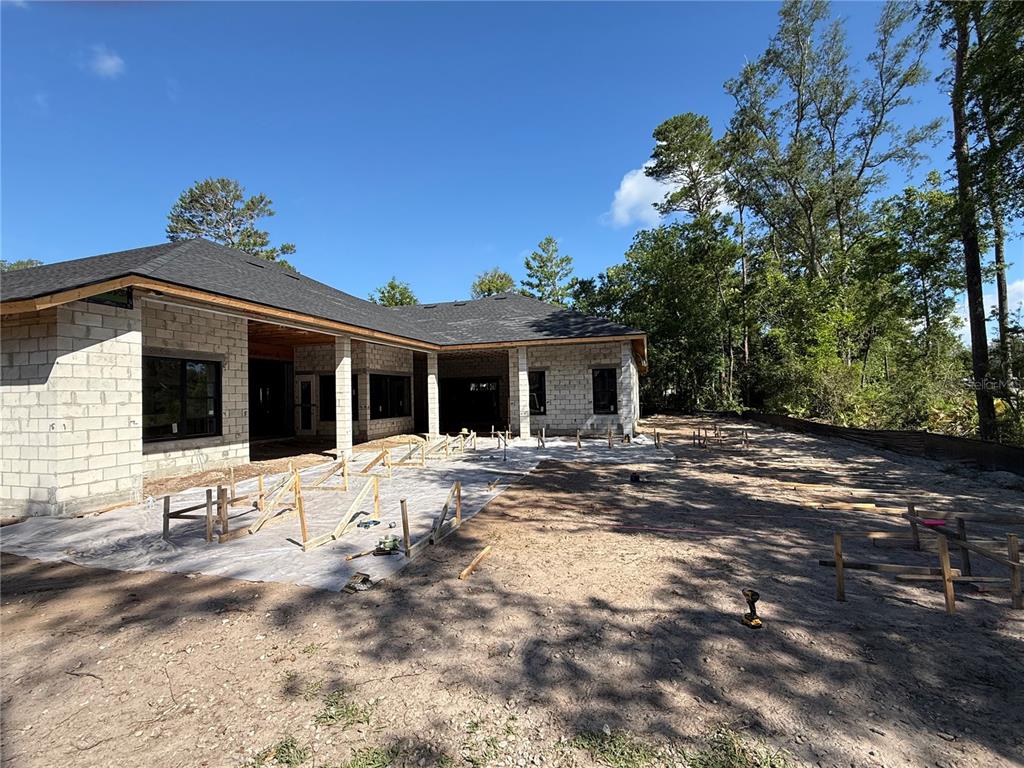 35 Broadriver Road Ormond Beach, FL 32174 - Photo 5 of 9 a view of a house with backyard and sitting area