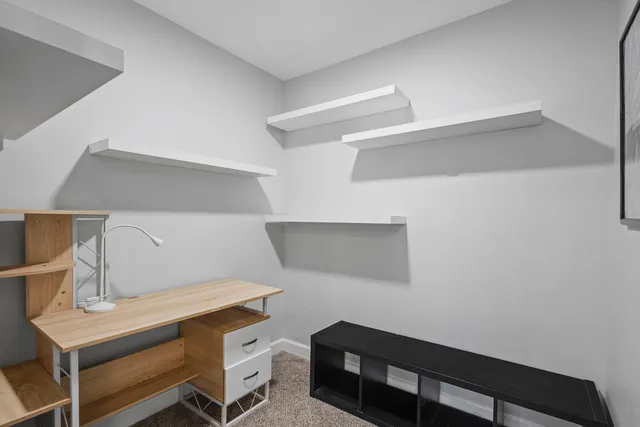 a room with a table and a workspace