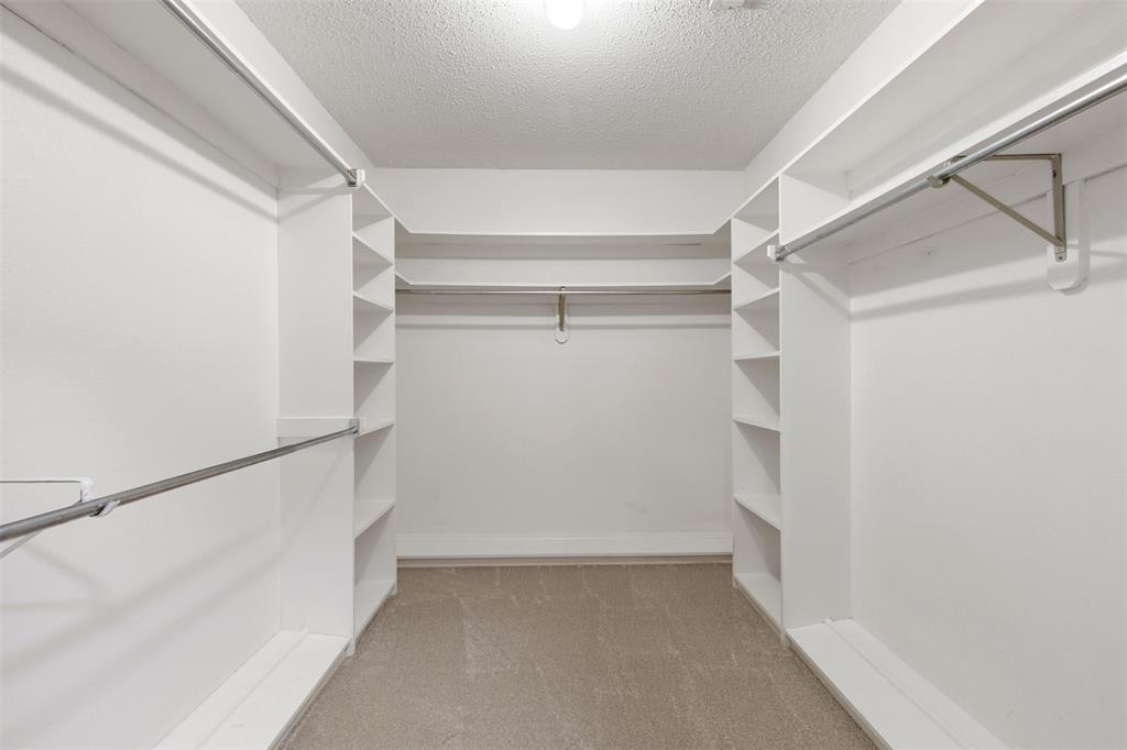 609 Seville Road Denton, TX 76205 - Photo 26 of 40 Primary walk-in closet. There are 2.