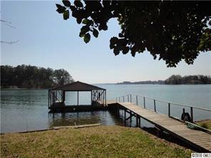 8404 Normandy Road Denver, NC 28037 - Photo 2 of 9 a view of houses with outdoor space and lake view