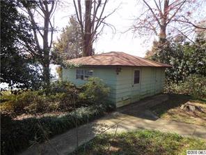 8404 Normandy Road Denver, NC 28037 - Photo 7 of 9 a view of a house with a yard