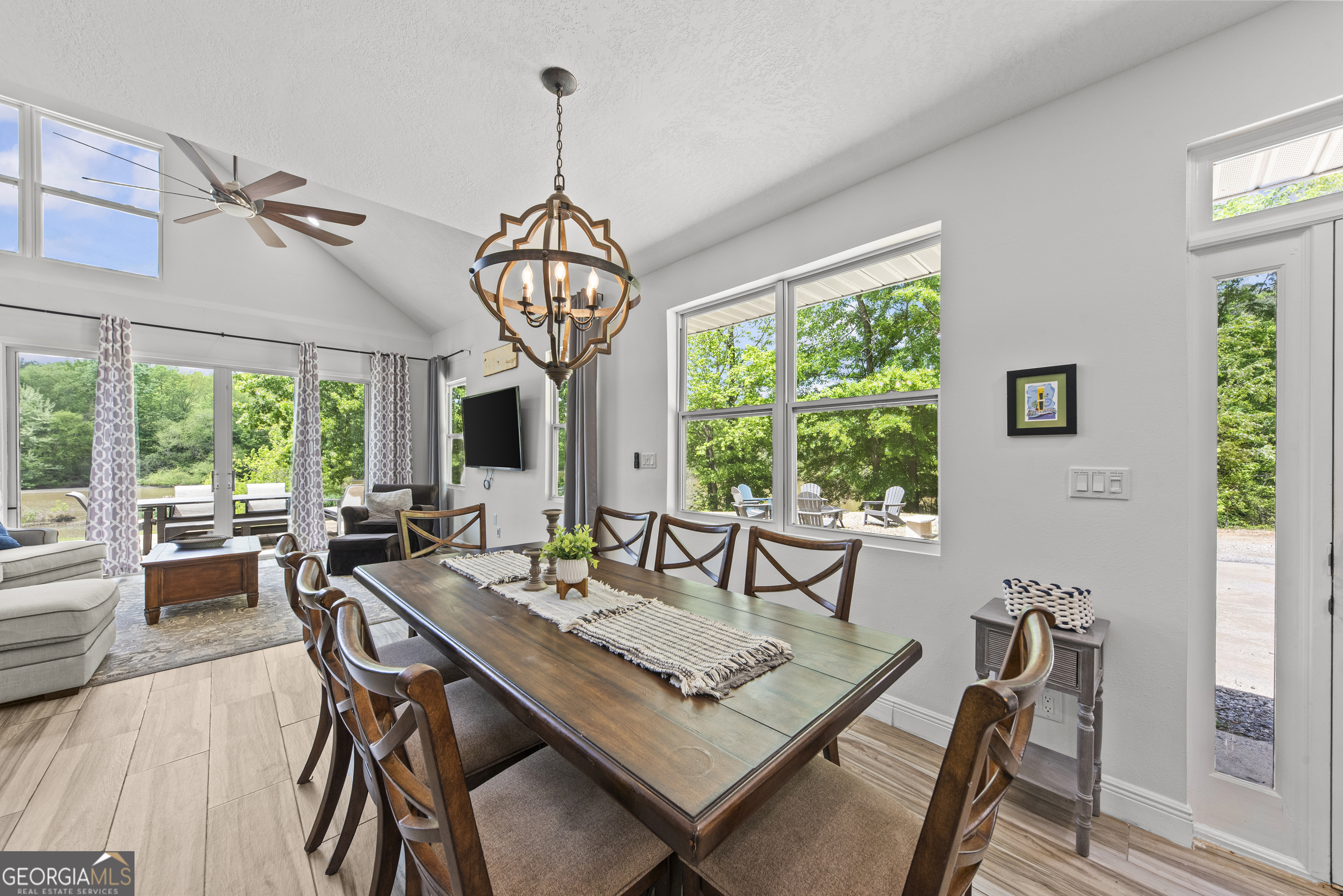 141 Edgewater Drive Eatonton, GA 31024 - Photo 32 of 85 a view of a dining room with furniture window and outside view
