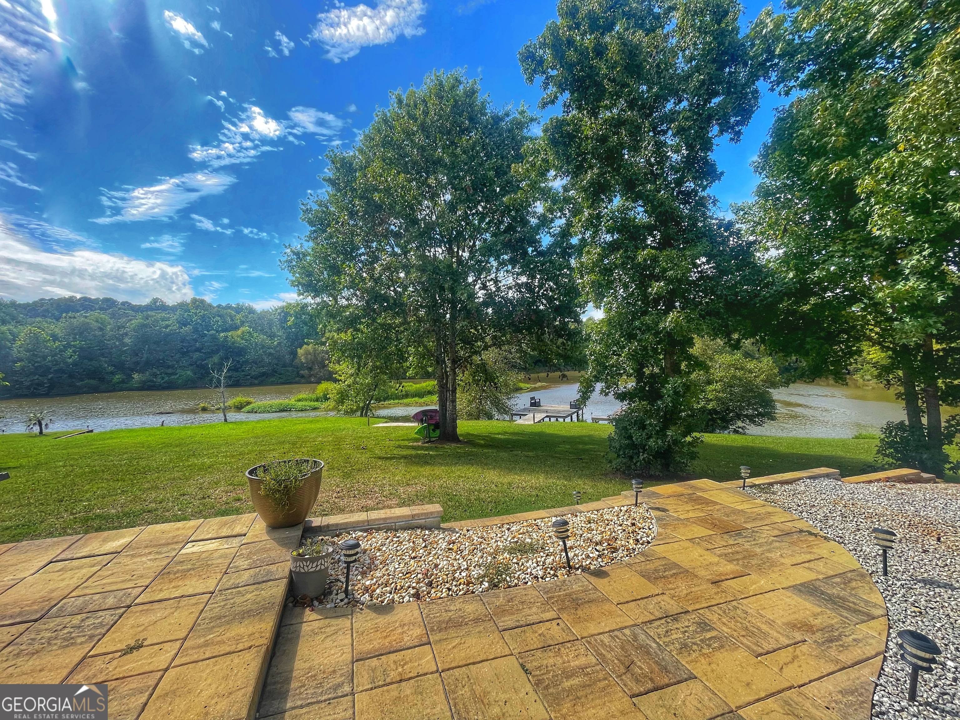 141 Edgewater Drive Eatonton, GA 31024 - Photo 57 of 85 a view of a garden with an outdoor space