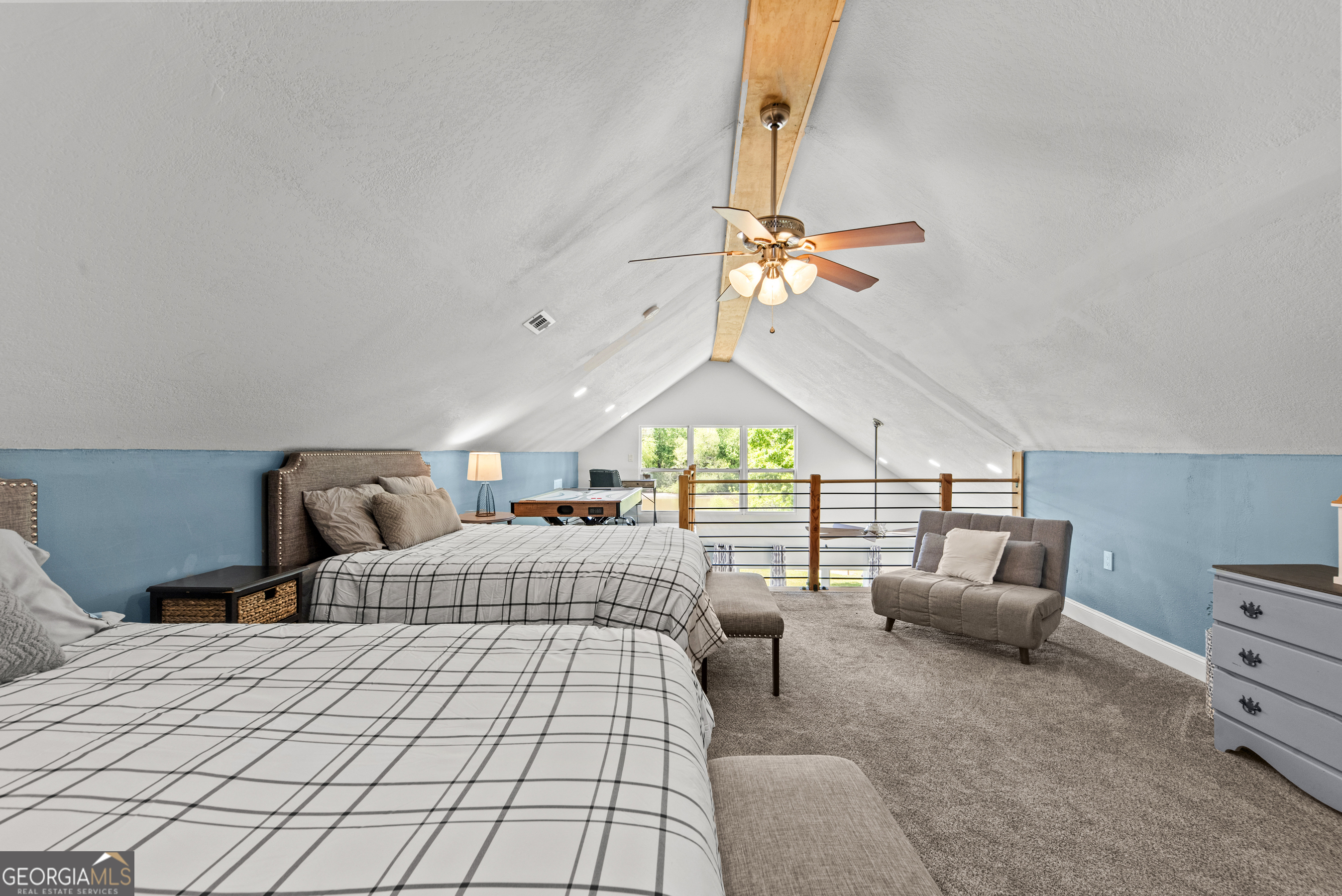 141 Edgewater Drive Eatonton, GA 31024 - Photo 68 of 85 a bedroom with furniture and a window
