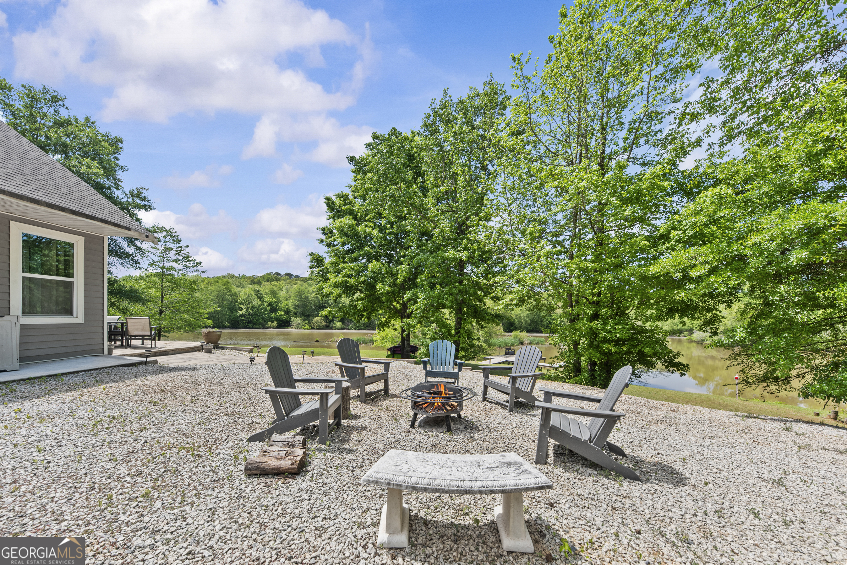 141 Edgewater Drive Eatonton, GA 31024 - Photo 75 of 85 a view of a backyard with sitting area