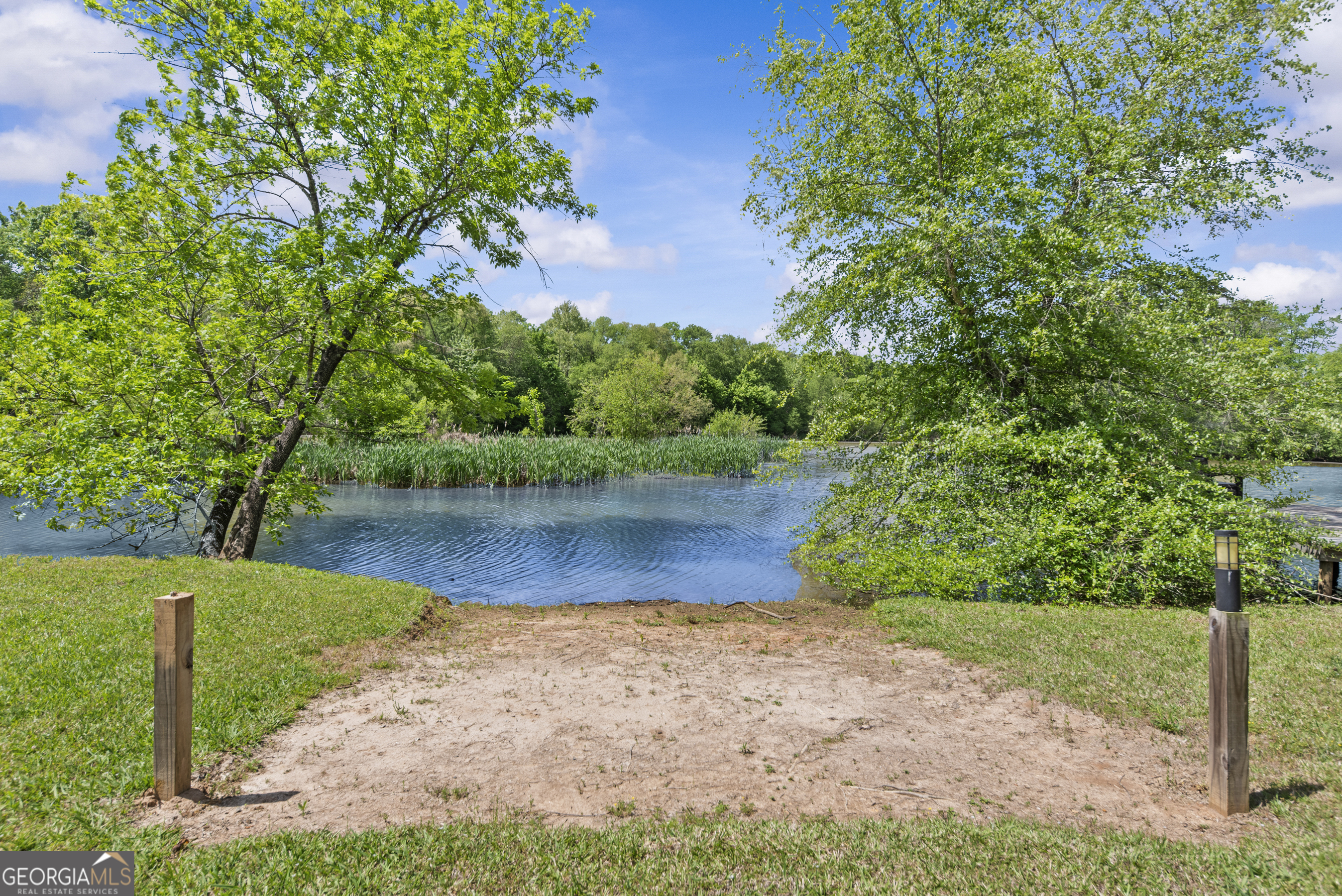 141 Edgewater Drive Eatonton, GA 31024 - Photo 80 of 85 a view of lake with a yard