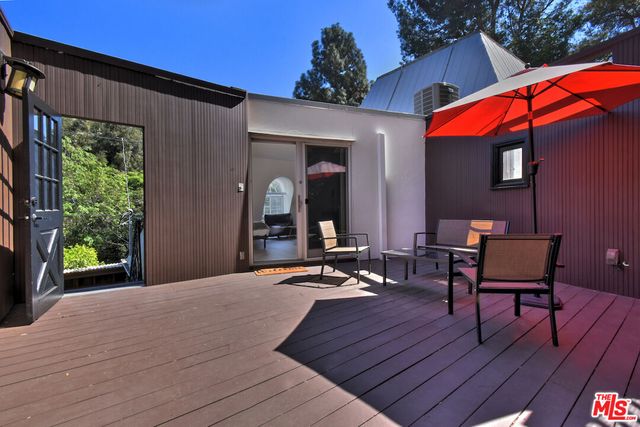 a view of a house with sitting area and furniture