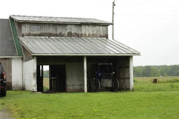 a view of a back yard of the house