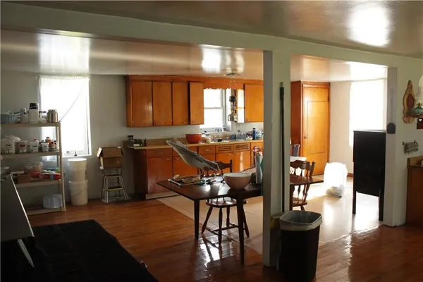 a view of a dining room with furniture window and outside view