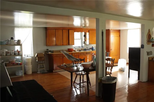a view of a dining room with furniture window and outside view