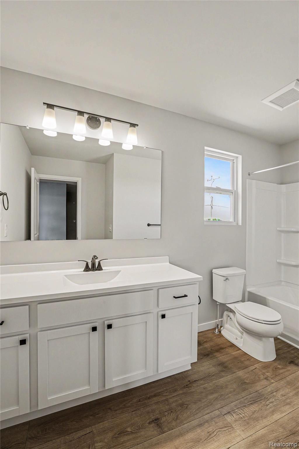 6030 Lahring Road Linden, MI 48451 - Photo 19 of 36 There is a full bath with tub/shower combo located on the second floor. The exterior window provides natural lighting.