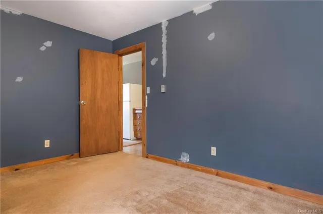 an empty room with a door