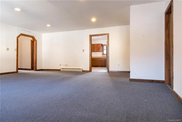 a kitchen with stainless steel appliances granite countertop a stove top oven a sink and dishwasher