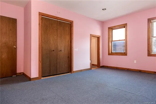 a view of living room filled with furniture