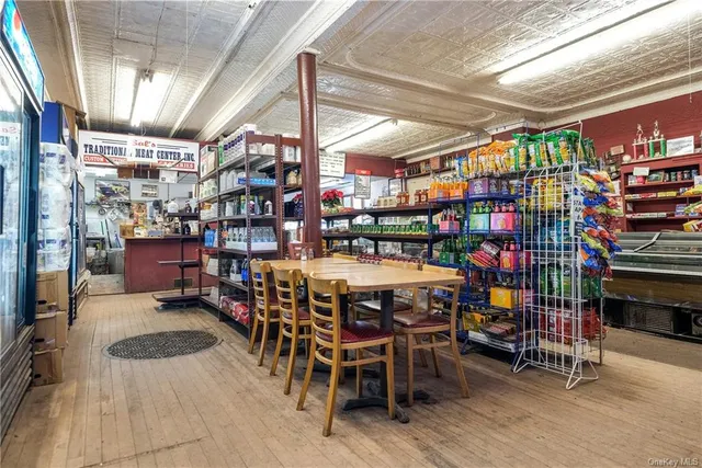 a room filled with lots of furniture and clutter