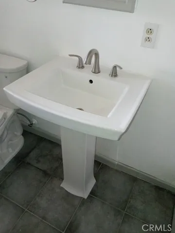 a utility room with a sink