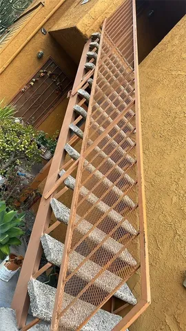 a view of outdoor space with wooden floor